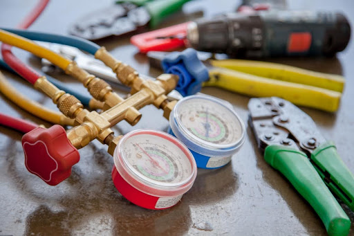 AC equipment and tools on a table.