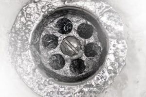 Water going down a drain.